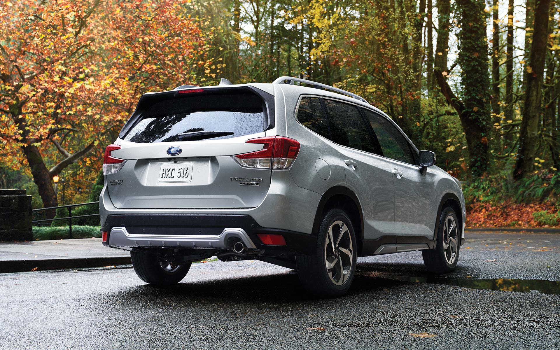 The rear of the 2022 Forester on a neighborhood street.