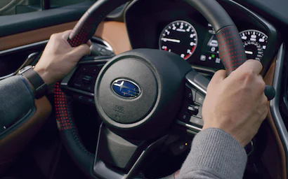 A photo illustration showing the heated steering wheel on the 2022 Subaru Legacy Touring XT.